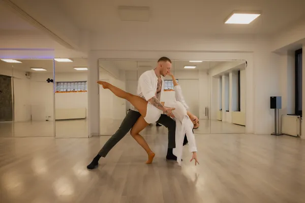 Couple dancing in a studio